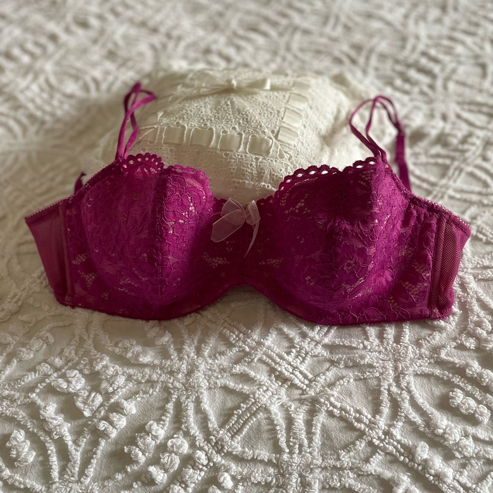 Cute and sassy b.tempt’d raspberry colored lace bra size 34DD